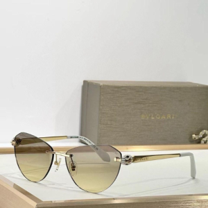 Bvlgari cat-eye sunglasses with gradient brown lenses and gold-tone temples