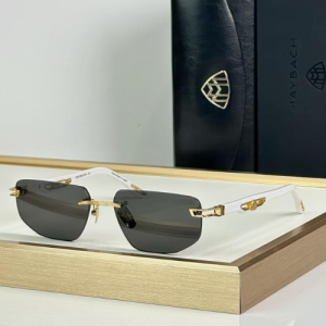 Maybach Sunglasses in Gold Frame Black Tint White