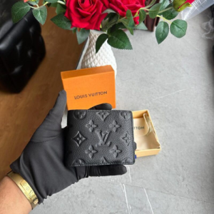 Louis Vuitton Monogram Embossed Leather Wallet in Black