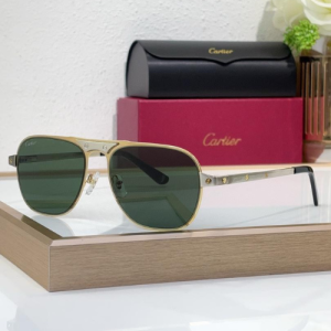 Cartier Sunglasses with Gold Frames and Green Tinted Lenses