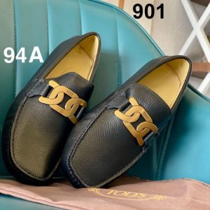 Tod's Loafers in Black with Gold Hardware