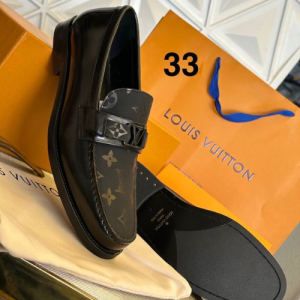 Louis Vuitton Loafers with a Black Leather Design