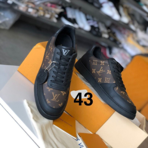 Louis Vuitton Sneakers with a Brown and Black Monogram Pattern