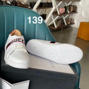 Gucci Sneakers with a White and Red Design