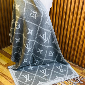 Louis Vuitton Stole With a Gray And White Pattern