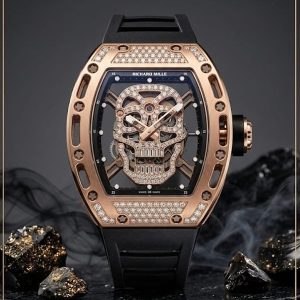 Richard Mille Tonneau-Shaped Rose Gold Watch With Diamond-Set Bezel And Black Rubber Strap